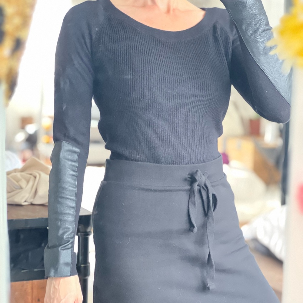 Feel the piece black sweater